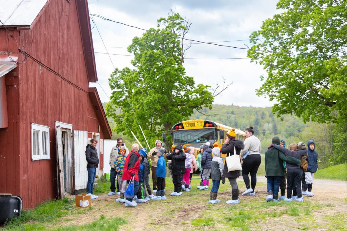 Cambridge Elementary students and their teachers circle up after their arrival to Paul-Lin Dairy in Bakersfield. VT. Cambridge Elementary students and their teachers circle up after their arrival to Paul-Lin Dairy in Bakersfield. VT.