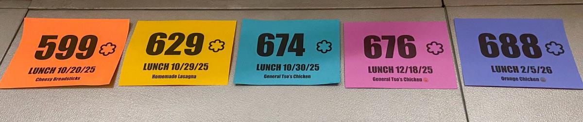 Five colorful lunch banners are displayed. Each lists a date and menu item, like 599 with "Crunchy French Toast" on 10/20/25. Five colorful lunch banners are displayed. Each lists a date and menu item, like 599 with "Crunchy French Toast" on 10/20/25.