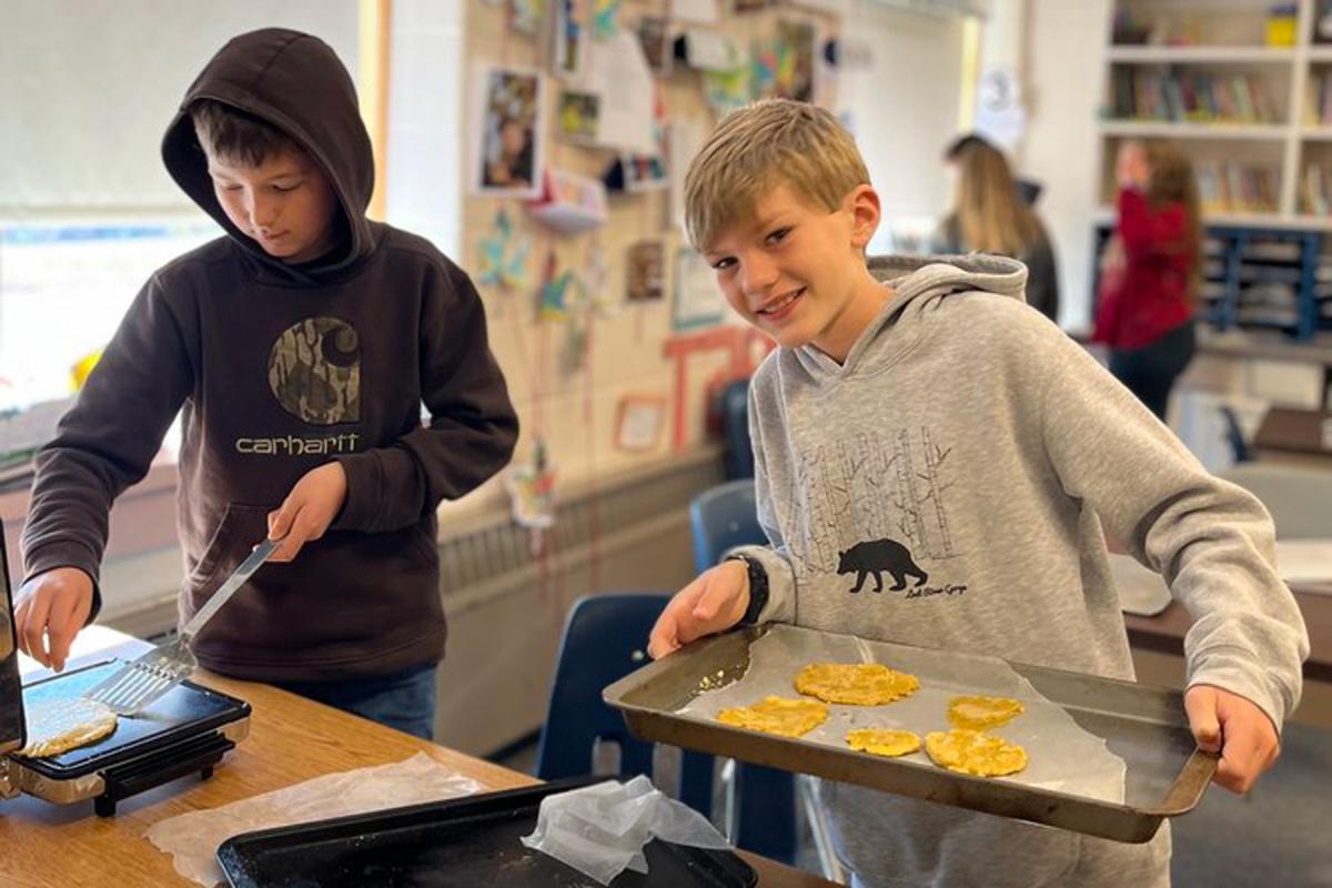 Dummerston cook up tortillas made from local masa. Photo by Food Connects. Dummerston cook up tortillas made from local masa. Photo by Food Connects.