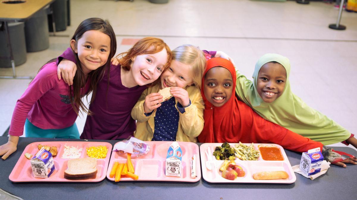 School children enjoy fresh, locally sourced meals in the cafeteria. Photo by Hunger Free Vermont. School children enjoy fresh, locally sourced meals in the cafeteria. Photo by Hunger Free Vermont.
